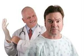 The doctor conducts a digital examination of the patient's prostate before prescribing a treatment for prostatitis